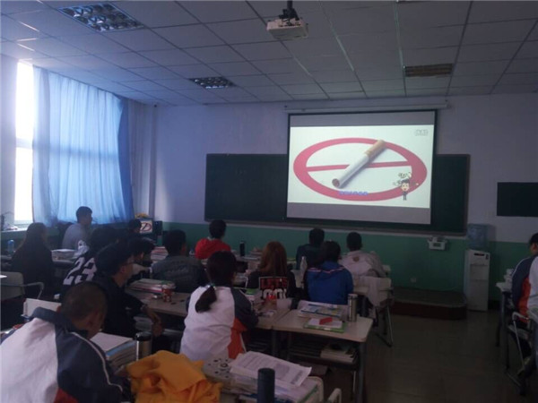 信息工程系开展“热爱校园，远离香烟”文明宣传活动